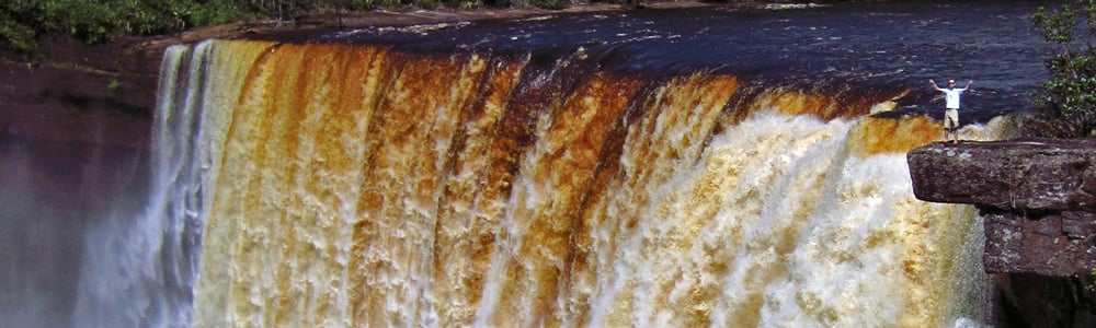 Waterfall with Brandon Cox next to it