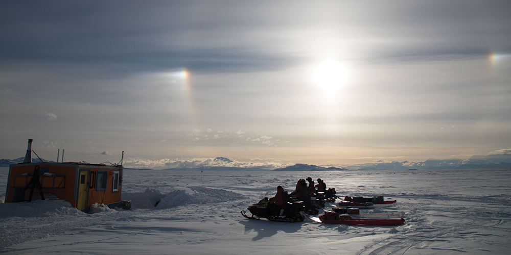 Antarctica with people of snow sled