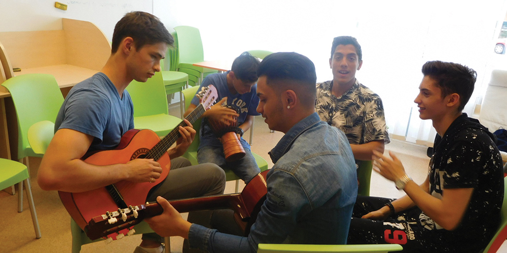 Students playing musical instrument