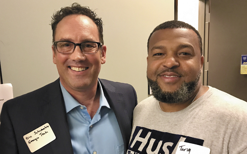 Eric Schumacher with one of his former students, Tariq Baiyina