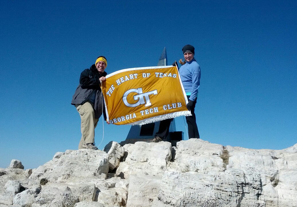 Tech grads on top a mountain