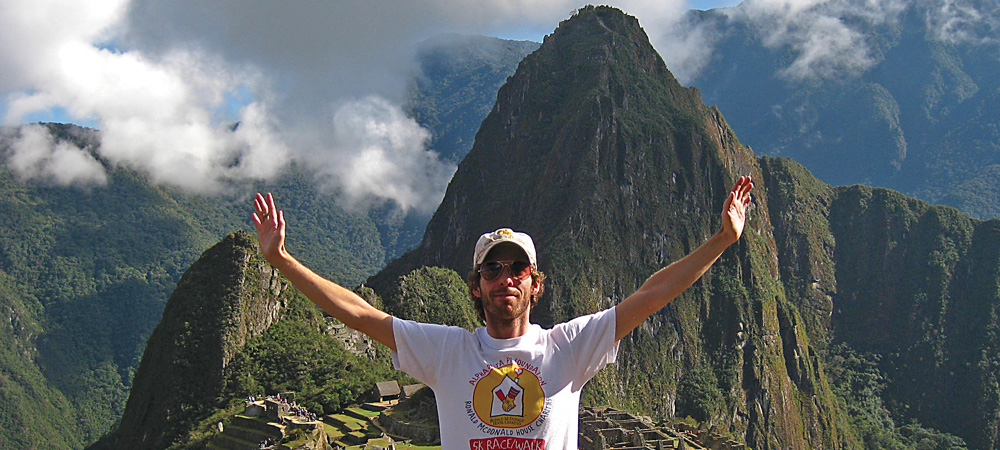 Brandon Cox with Machu Pichu in the background