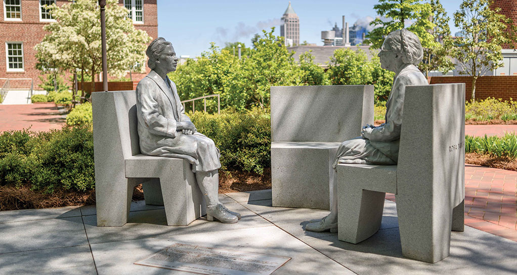 The marble Continuing the Conversation statue