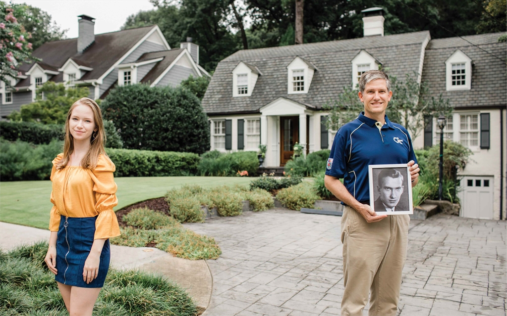 Randy Mcdow with a picture of his grandfather
