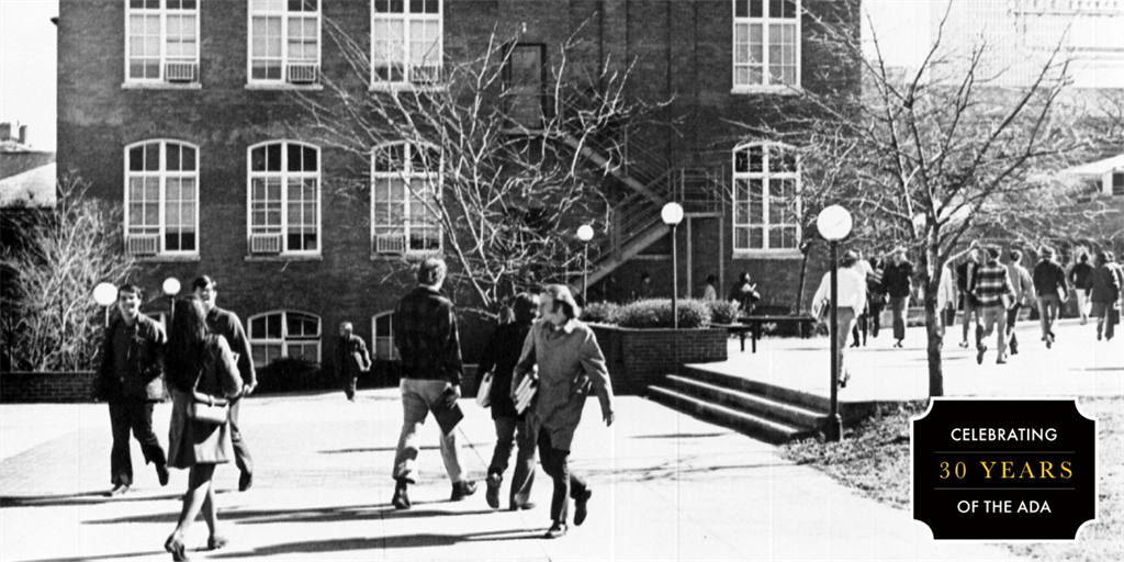 old picture of Tech's campus with students walking 